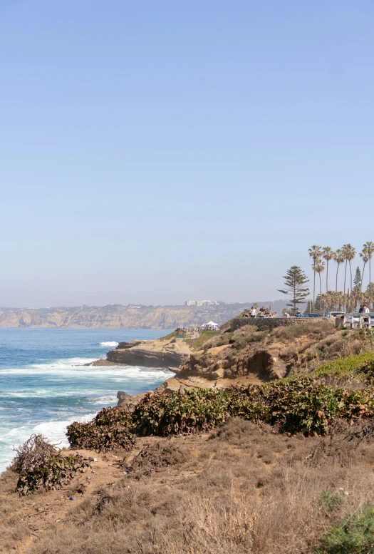 a sign that reads the name of the beach area