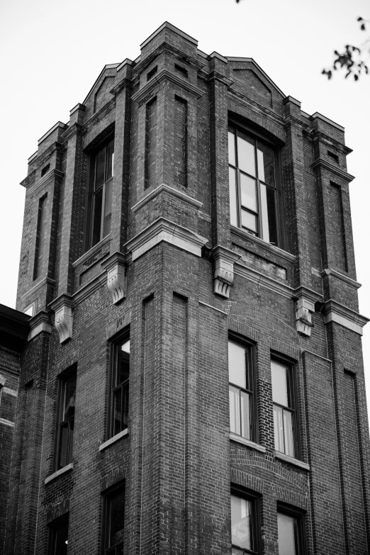 the front facade of a building with multiple windows