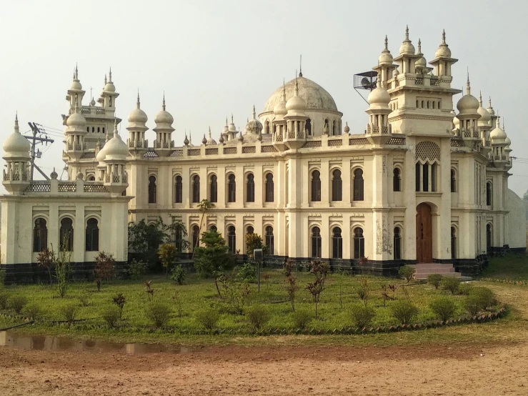 a large building with domes and towers on the roof