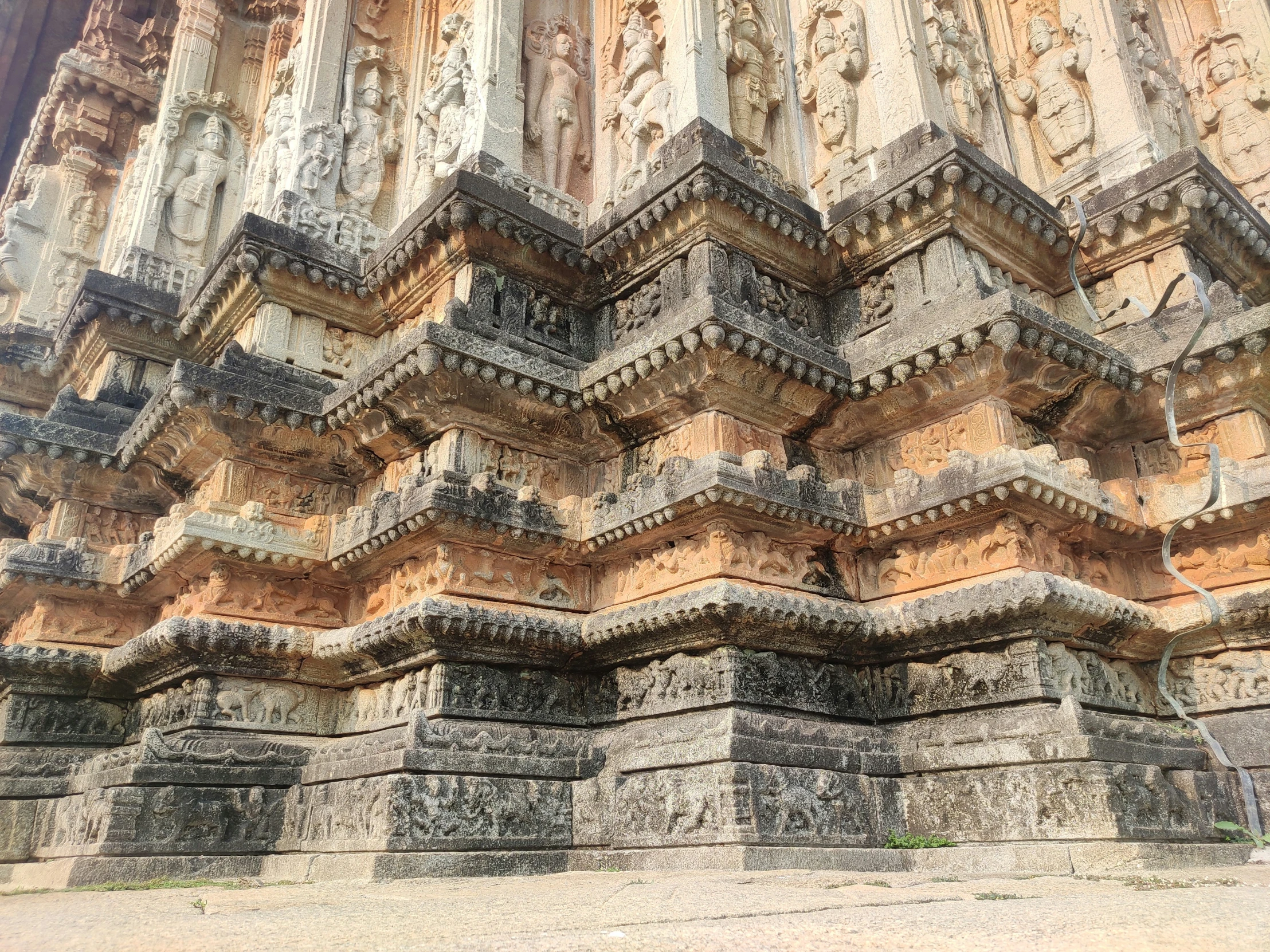 a decorative area in front of a stone structure