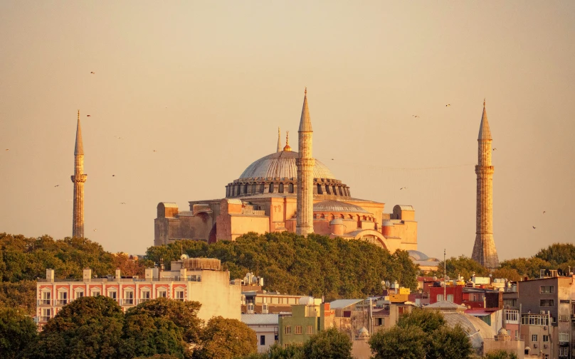 the view of a large church from across the water