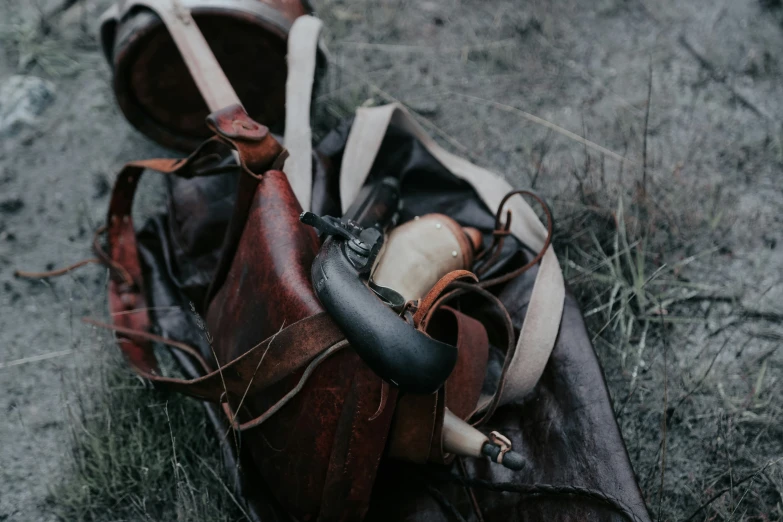 a leather bag is on top of an object