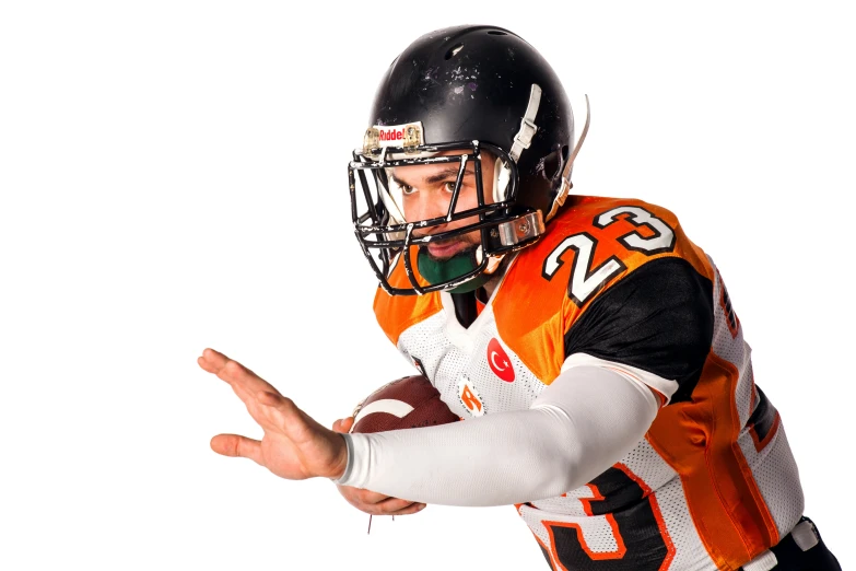 a man wearing an orange and black football uniform