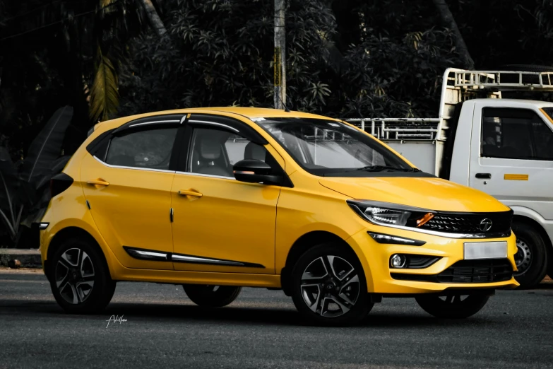 an image of a yellow car that is parked