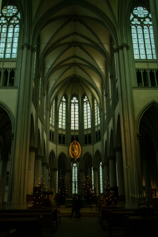 people standing in front of an elegant cathedral