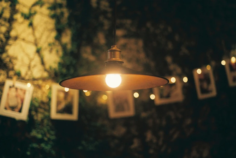 light bulb hanging from ceiling in outdoor setting