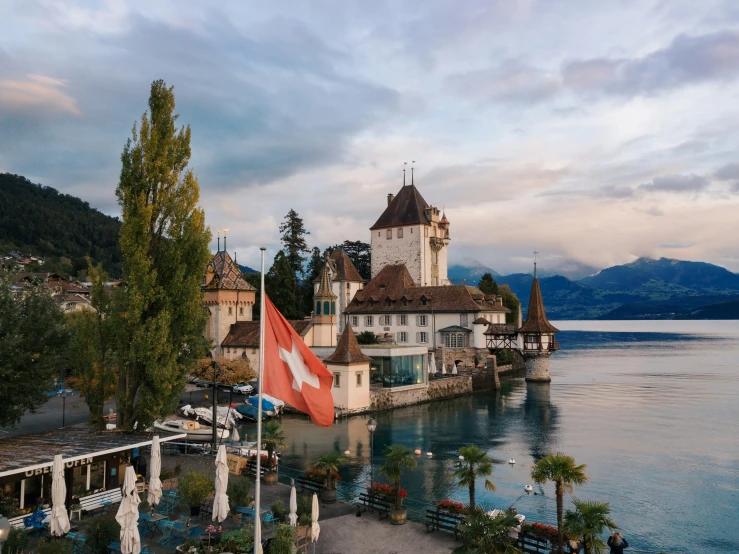 a large lake sitting next to a large building