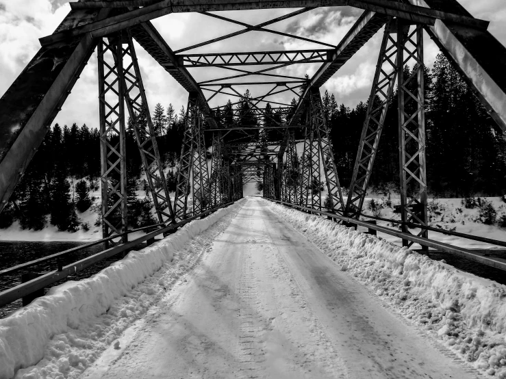 black and white pograph of a railroad bridge