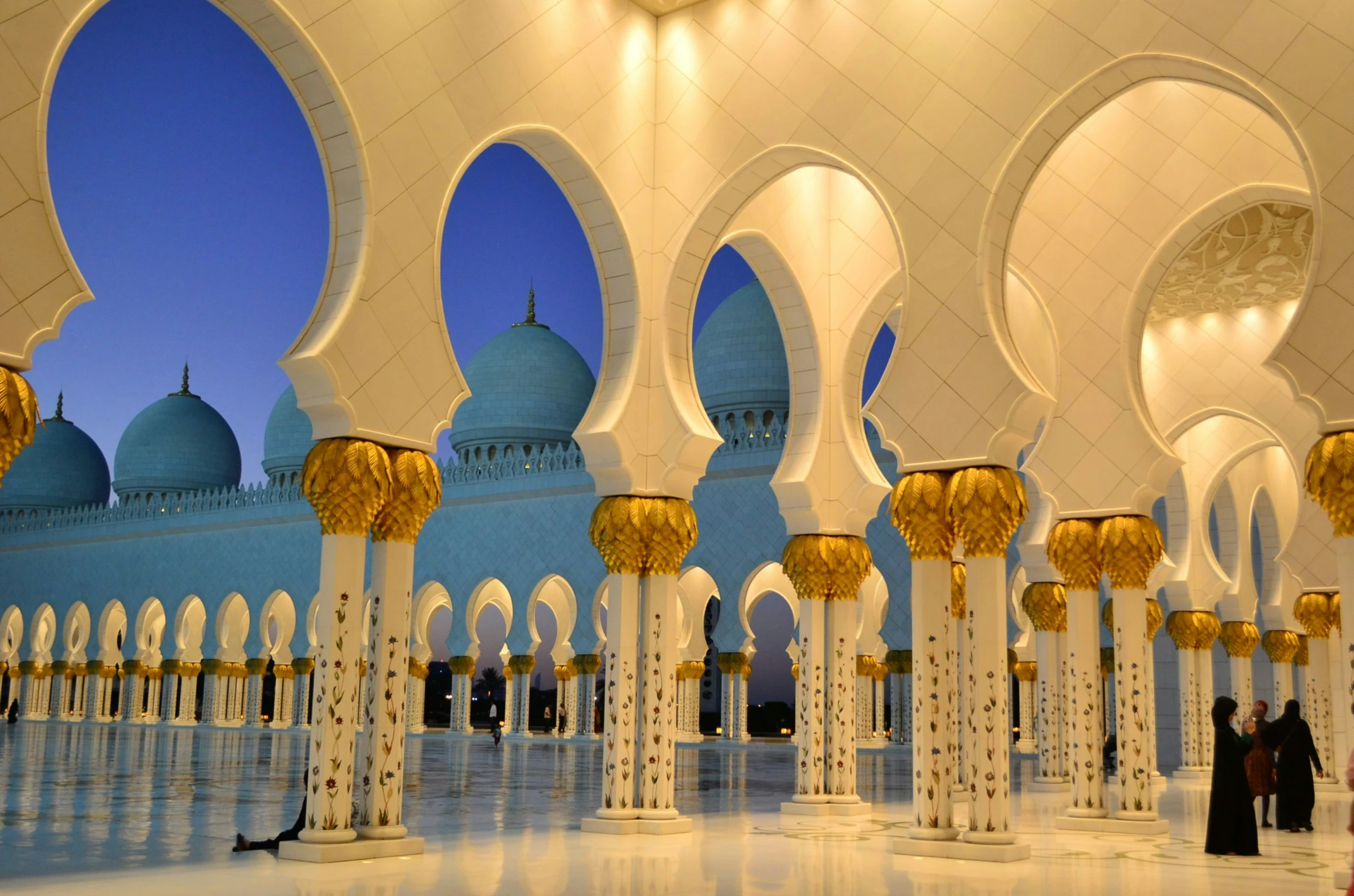 an interior view of an oriental building with domes and columns