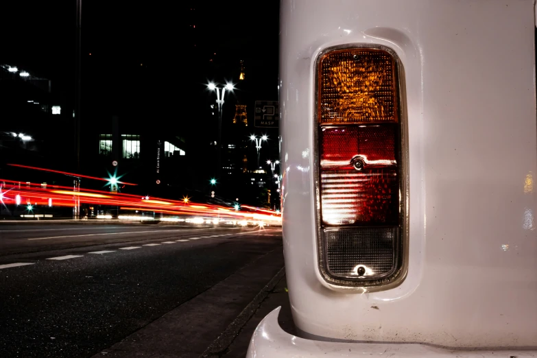 a white truck is shown with lights on