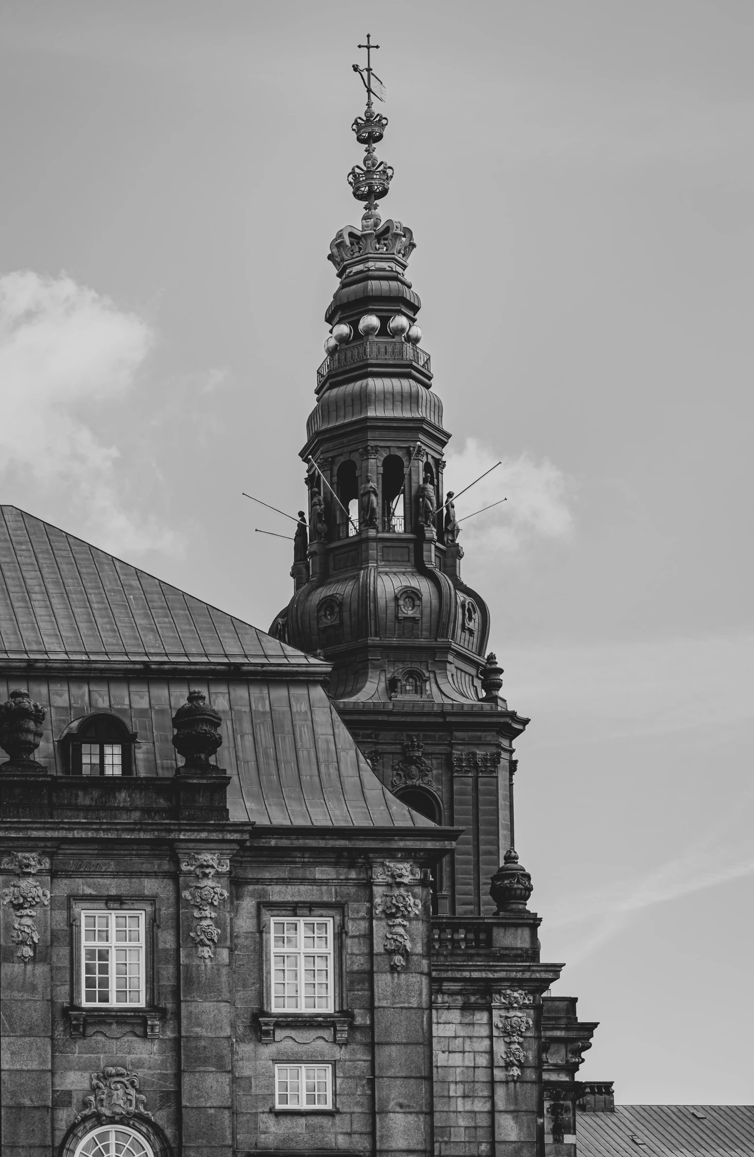 this black and white po shows an old building with a steeple