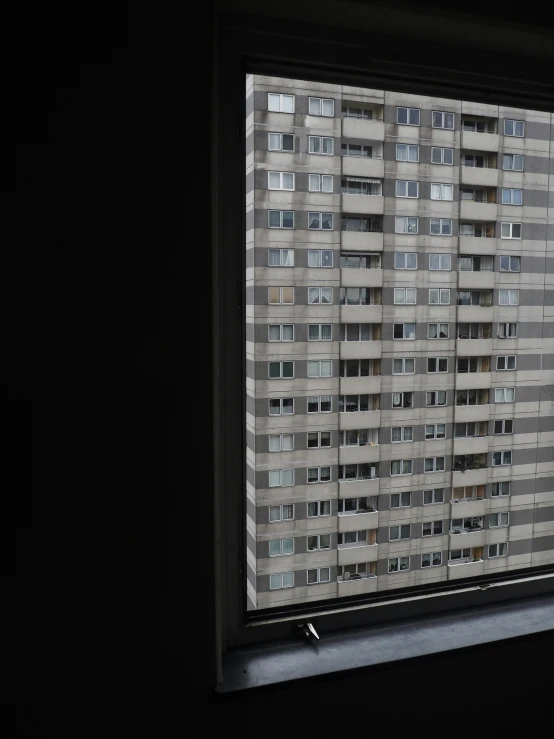 a window with lots of windows and blinds in it