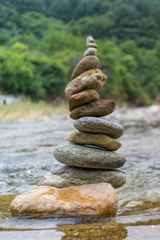 several rocks stacked up in the river