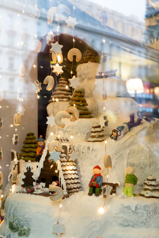 a store window is seen with christmas decorations