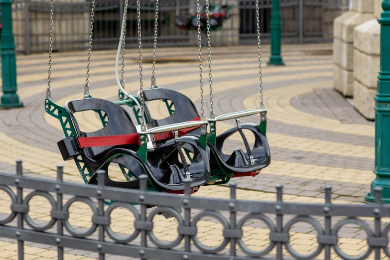 a child's swing set on a playground