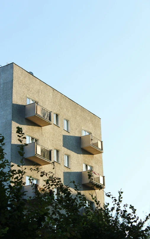 a building is shown with balconies on the balcony