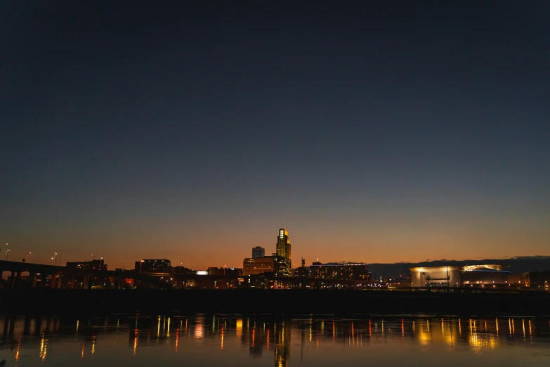 a very large body of water under a city skyline