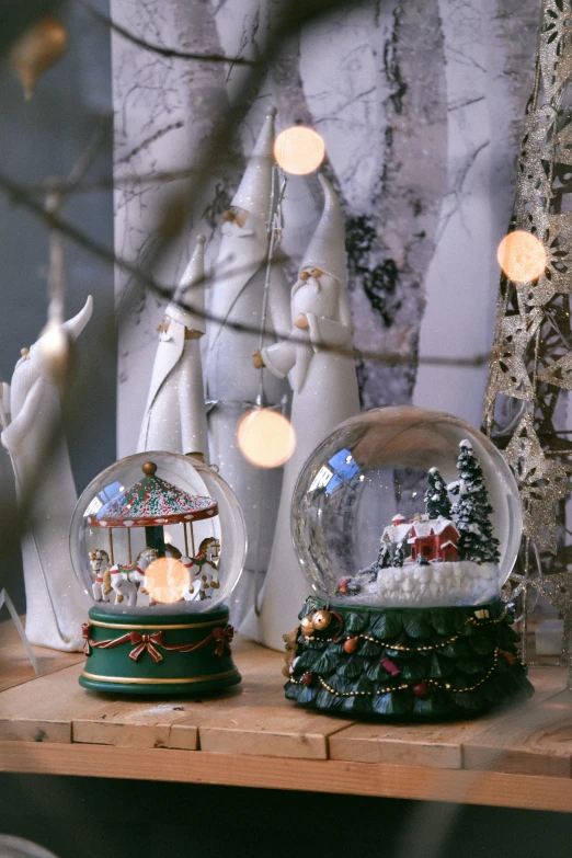 the snow globe is sitting on the table