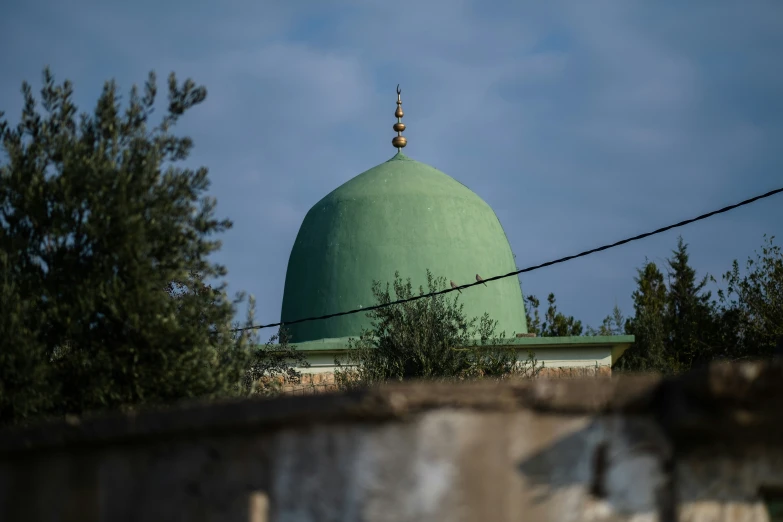 the dome of an old building with a sky background