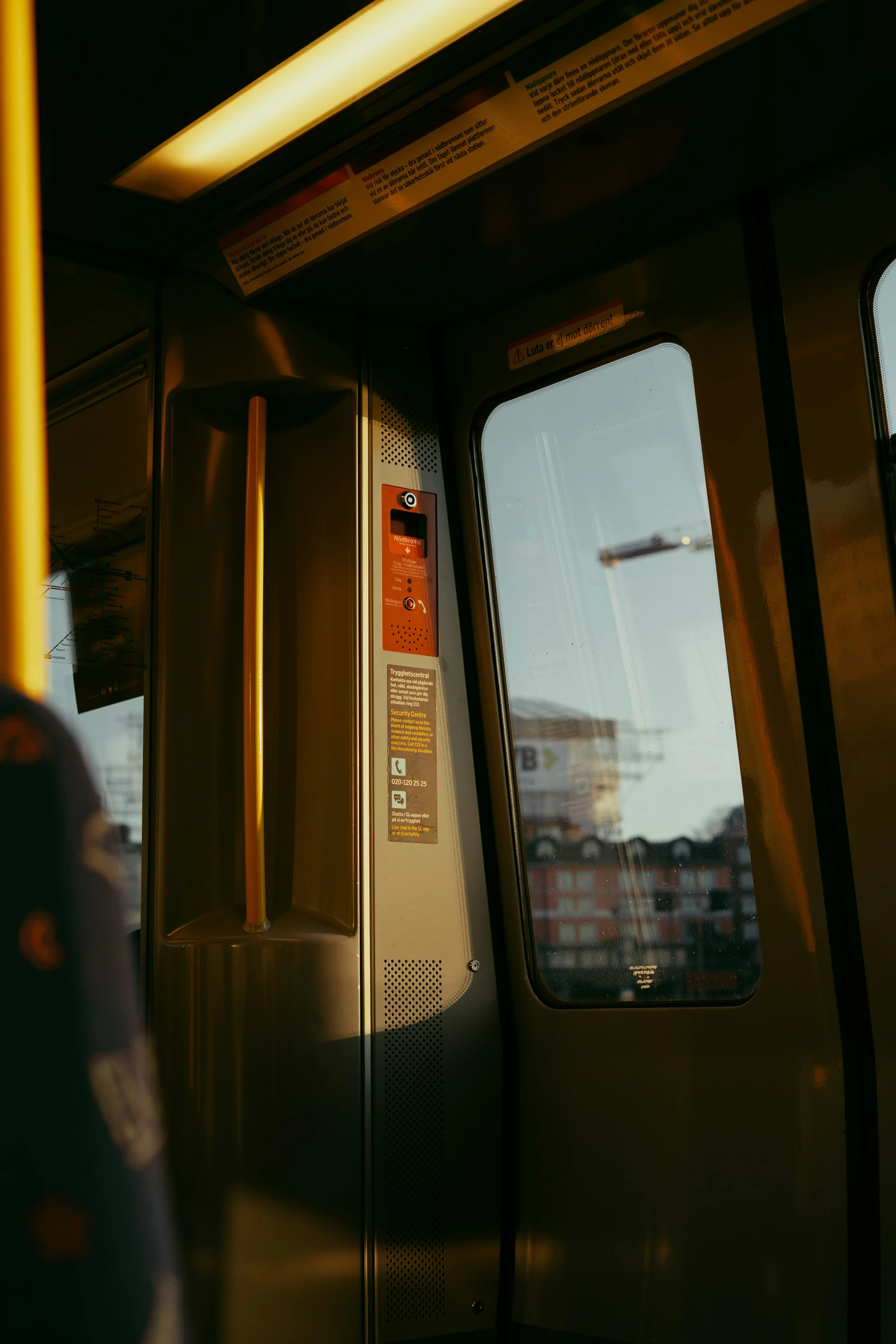 a close up po of some metallic doors on a train