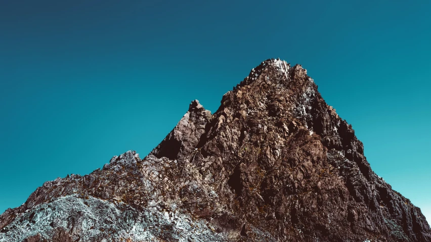 a snowy mountain is covered with snow