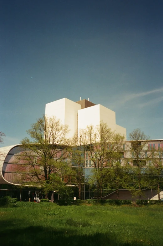 a large building with two windows in front of it