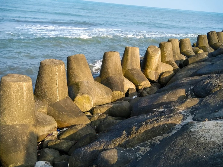 there is a large stone block by the water