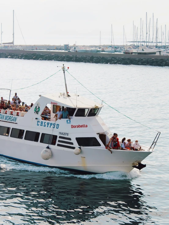 a boat with people riding in the back