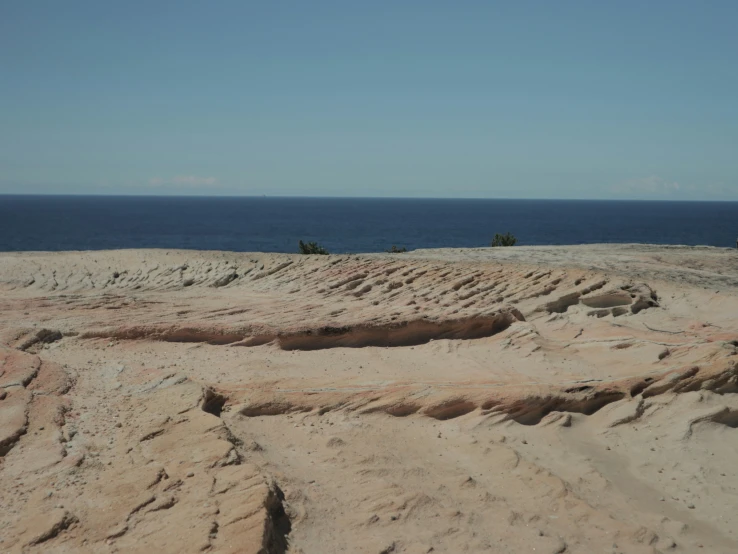 a beach with lots of sand that is very large