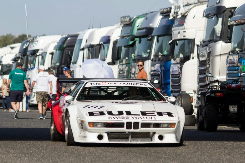 two racing cars lined up next to each other