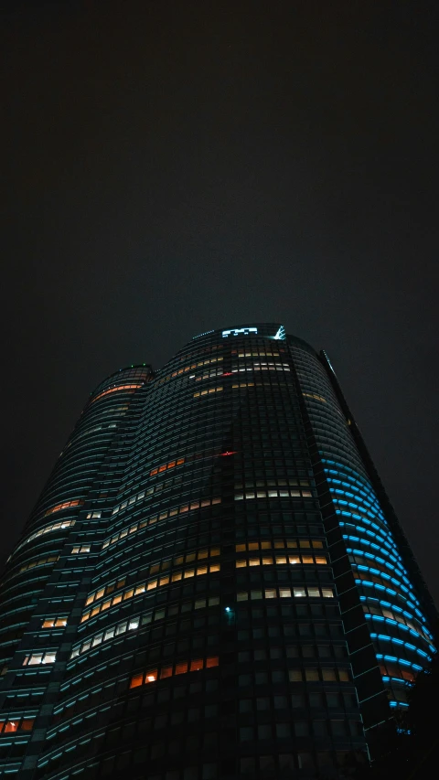 a night view of an office building from the ground