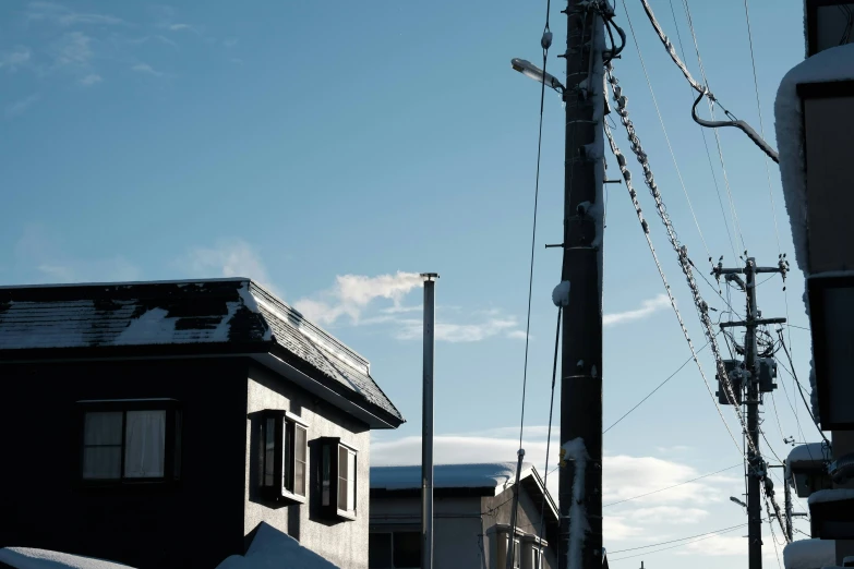 wires are on the street outside and around a house