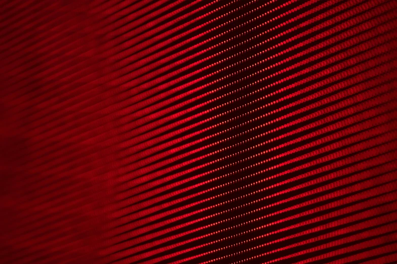 a po of red lines with a dark background