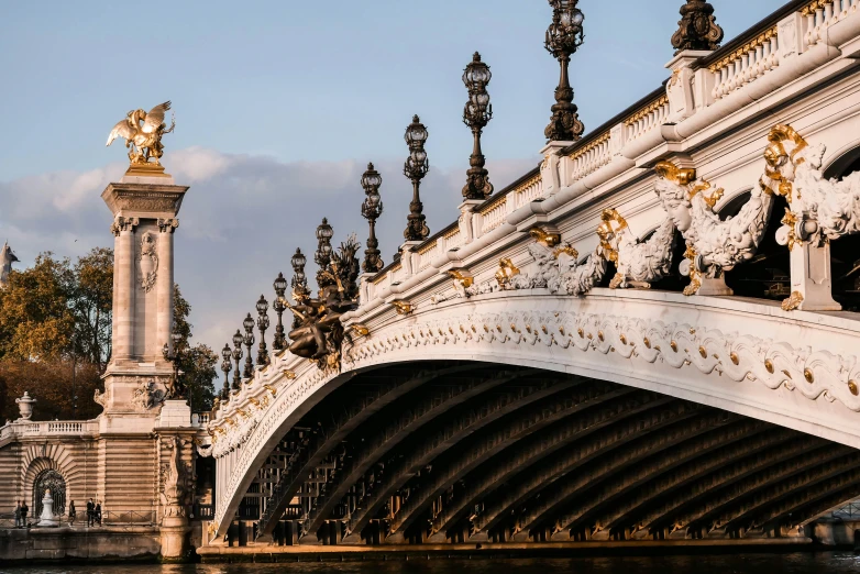 the bridge has a statue on the top