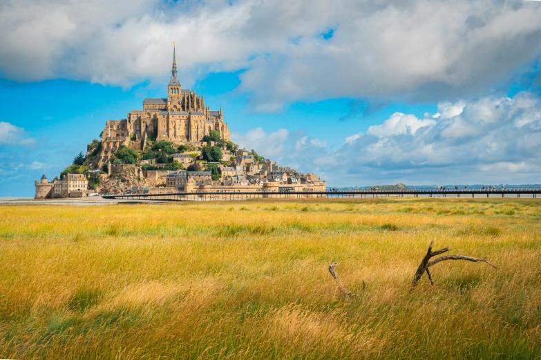 an island with a large stone building on top of it