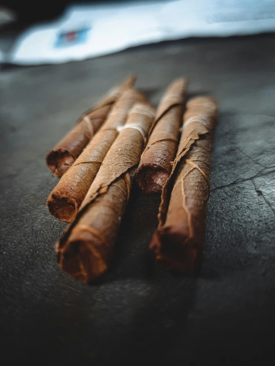 cinnamon sticks on the ground that are ready to be used as spice