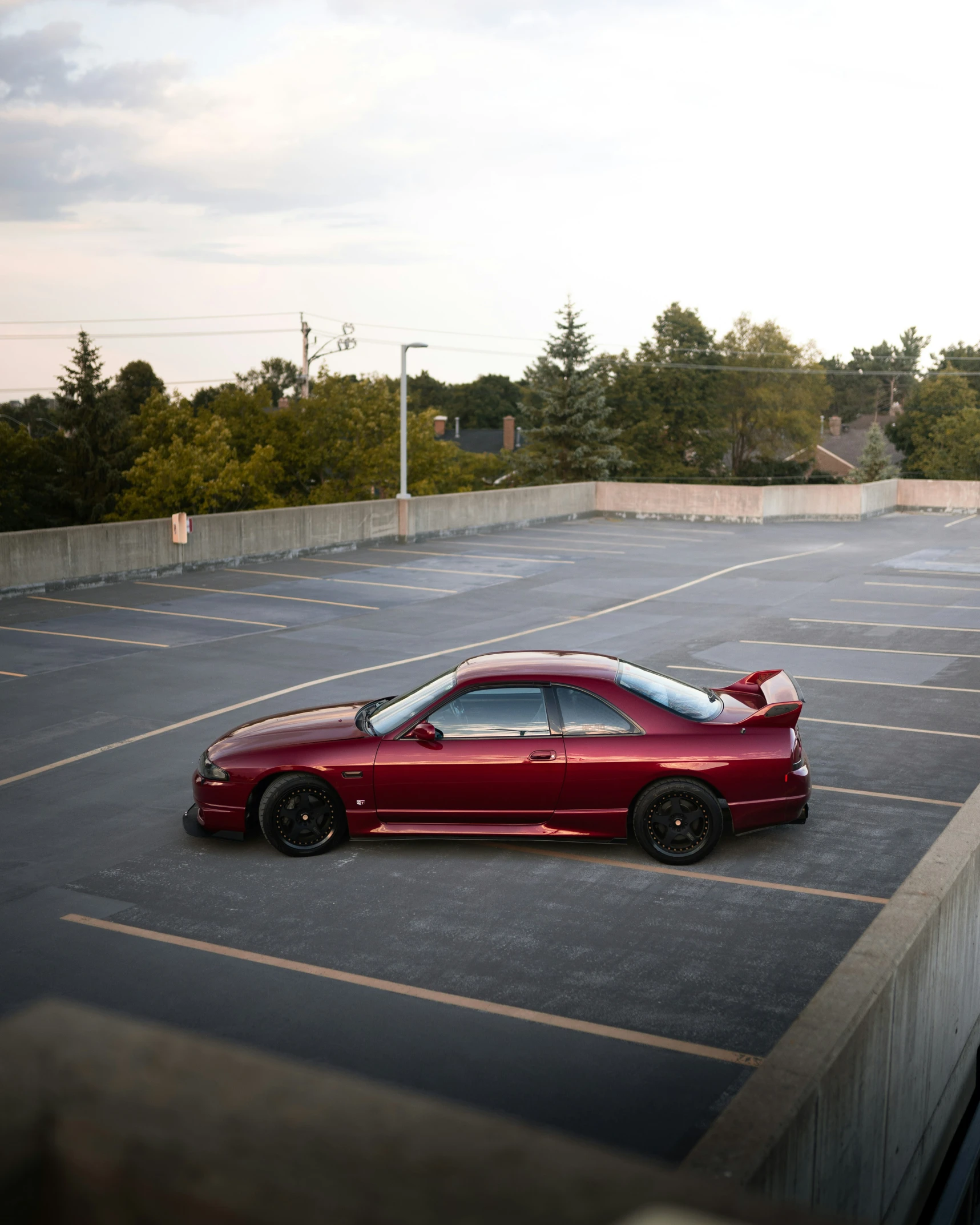 a sports car sitting in the parking lot