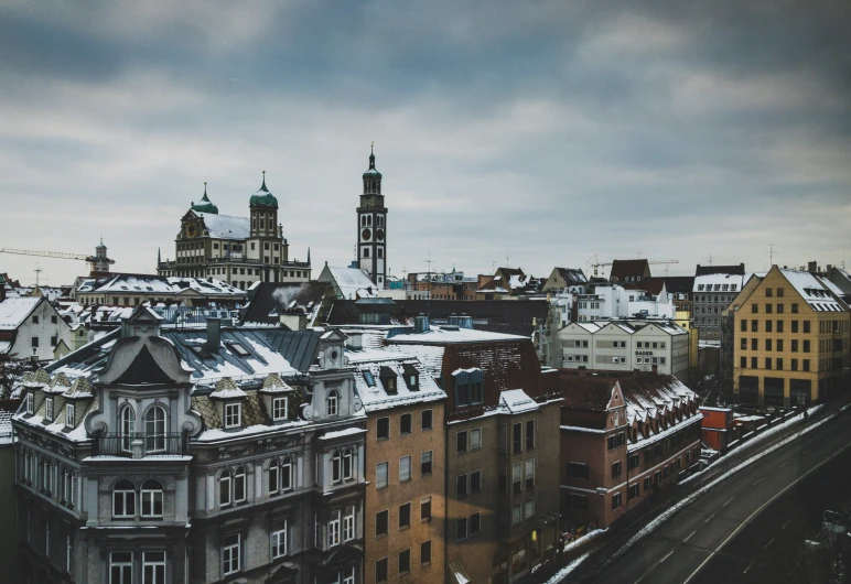 a city that is covered in snow and with tall buildings