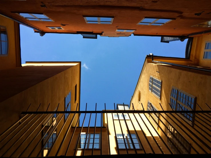 the top half of a building with several windows