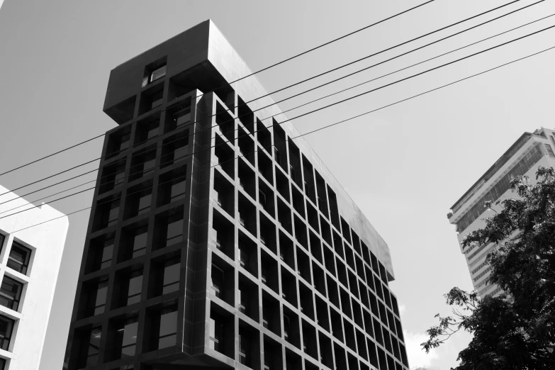 the high rise building has very large windows