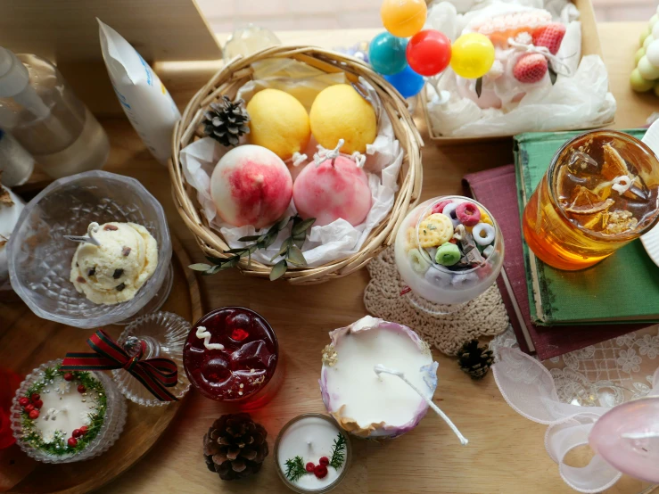 a table that has several baskets and bowls of food on it