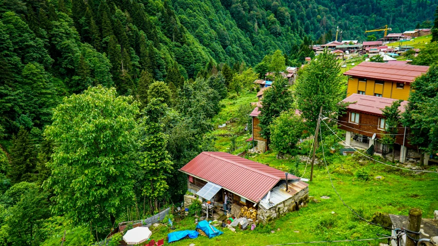 the houses near the mountains are colorful