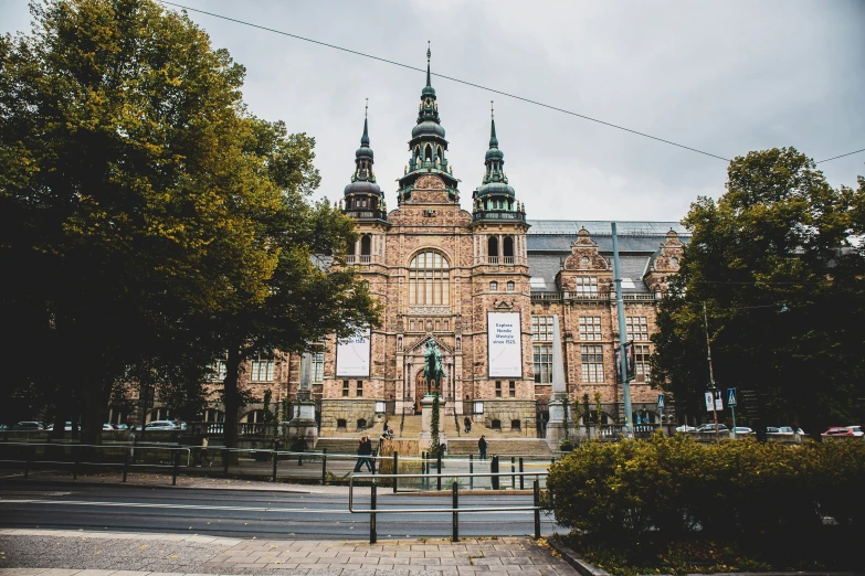 a church building sits at the corner of the street