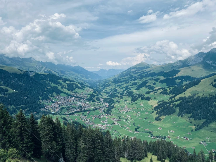 a mountain resort nestled near trees and other mountains