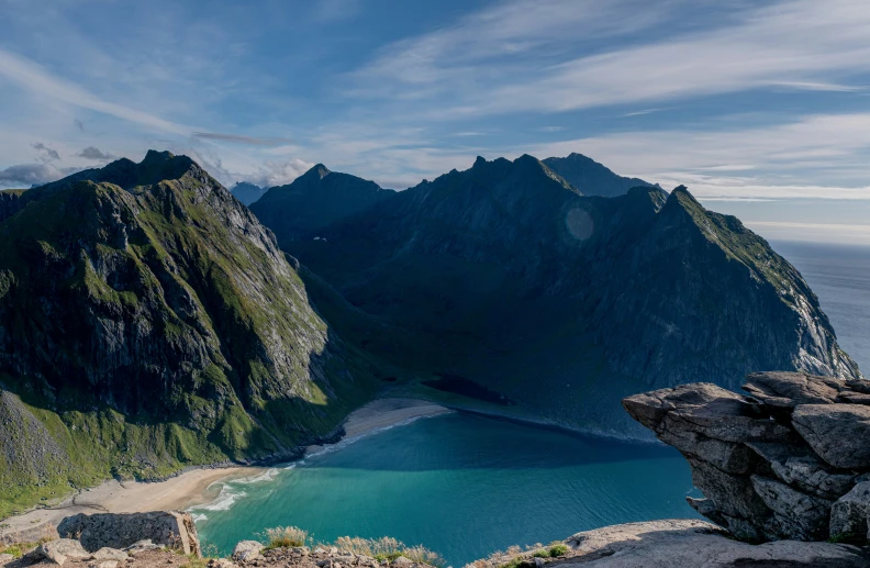 the landscape of a mountain valley in the middle of the ocean