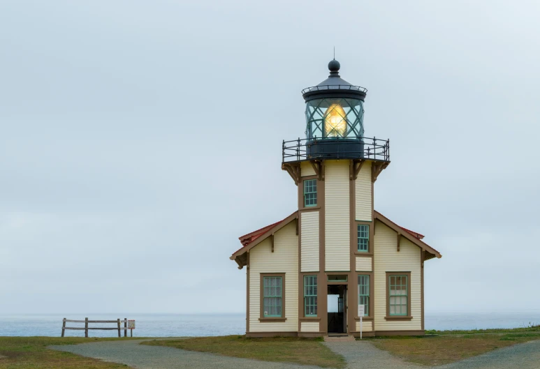 a tall tower with a clock in the center