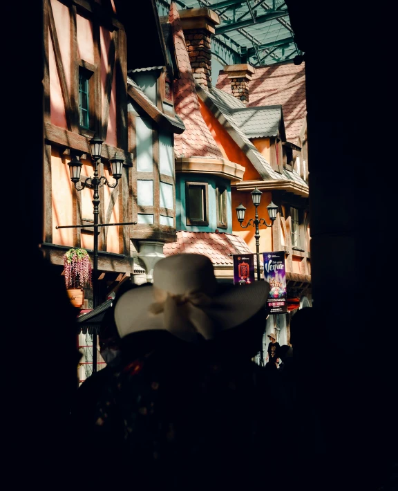 cowboy hat and other old houses outside a window