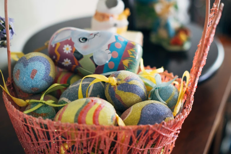 an adorable basket of bright colored stuffed animals