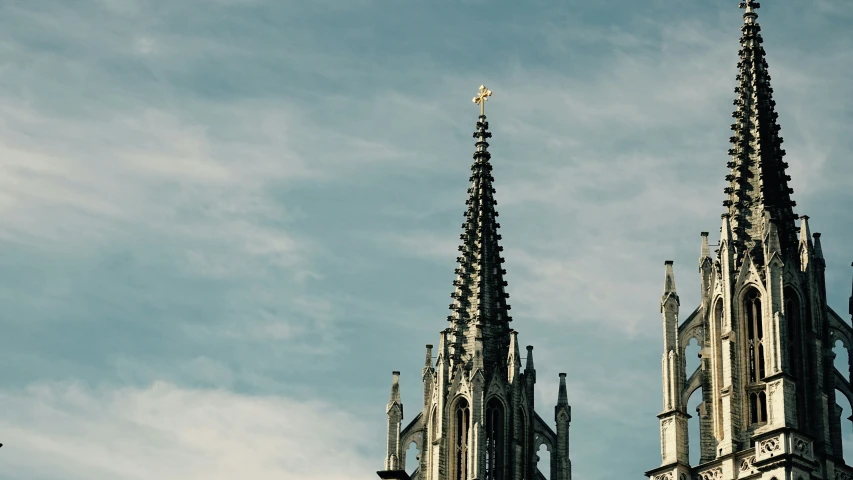 two spires on the steeple of a church