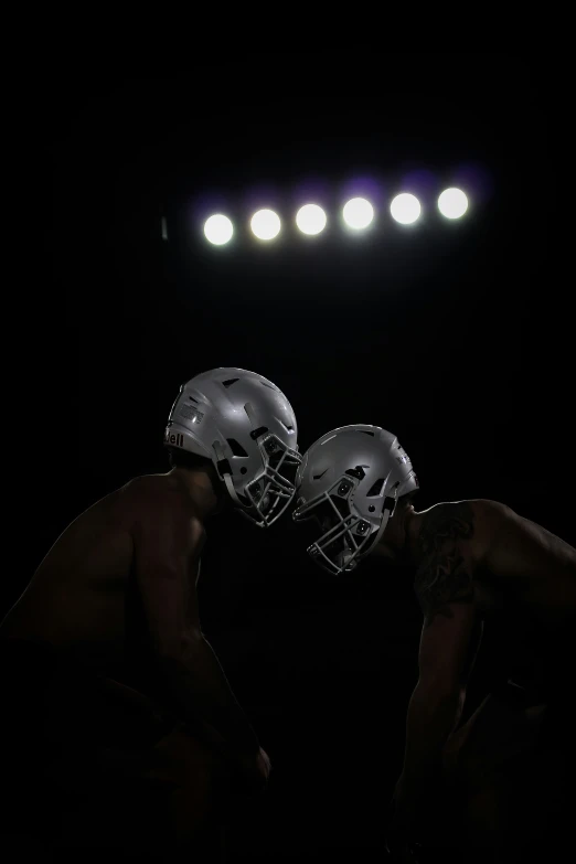 football players are lined up before a game